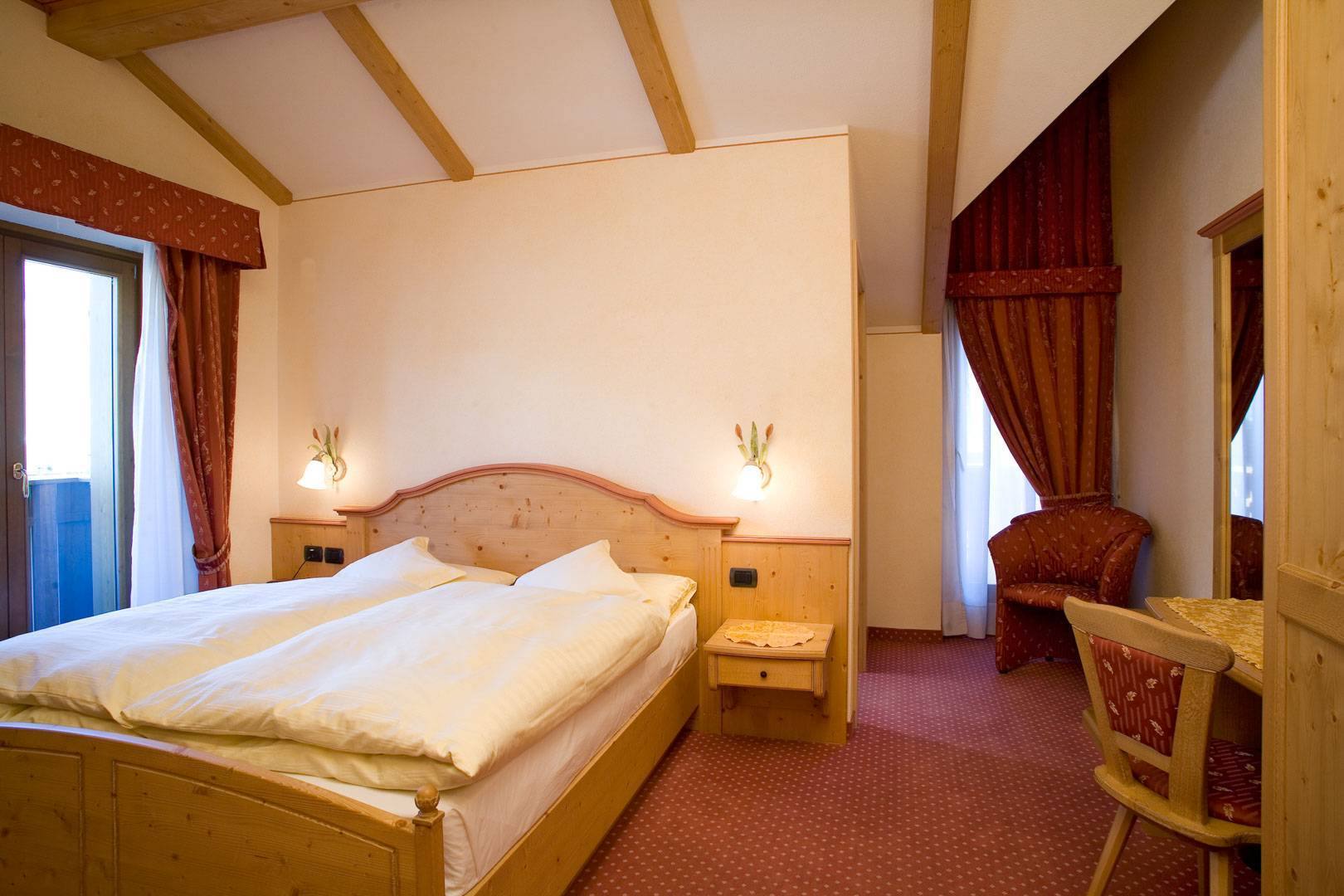 Junior Suite Panorama: travi in legno a vista